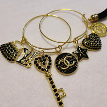 Load image into Gallery viewer, BLACK AND GOLD CHARM BRACELETS
